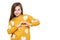 Studio portrait of a little girl on white background making a heart gesture with her hands. Fostering a child.