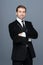 Studio portrait of a smiling fashion young businessman