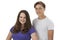 Studio Portrait Of Teenage Couple Against White Background