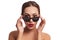 Studio, portrait and woman with sunglasses for fashion, makeup and beauty with mockup. Female model, cosmetics and red
