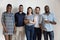 Studio portrait young successful diverse business people team.