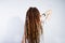 Studio shoot of girl in gray dress with dreads