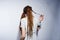 Studio shoot of girl in gray dress with dreads