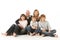 Studio Shot Of Family Group Sitting