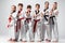 The studio shot of group of kids training karate martial arts