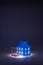 Studio shot of illuminated blue house