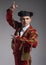 Studio shot of man dressed as Spanish matador