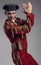 Studio shot of man dressed as Spanish matador