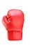 A studio shot of a red boxing glove