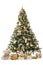 Studio shot of a richly decorated christmas tree with golden ornaments isolated on a white background with a presents