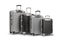 Studio shot of silver and black suitcases with wheels