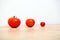 Studio Shot of three cherry tomatoes in a row
