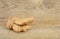 Studio shot of whole ginger isolated on wooden table