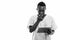 Studio shot of young black African man patient reading on clipboard while looking worried and biting his fingernail