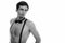 Studio shot of young handsome man thinking while wearing suspenders and bow tie shirtless