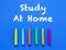 Study at home. Words or typed text on blue board. Colorful crayons. Top view
