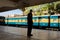 An stuff of Railway Nirapotta BahiniRNB giving patrol at an empty train standing at the platform