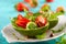 Stuffed avocado  with strawberries  and nut