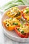 Stuffed colorful peppers with meat cheese vegetables