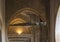 Stuffed crocodile hanging above the Puerta del Logarto or Door of the Lizard in the Seville Cathedral, Spain.