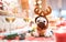 Stuffed dog toy wearing reindeer ears sitting upon table near champagne glasses on Christmas holidays background