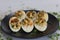 Stuffed eggs. Hard boiled eggs cut into half and stuffed with a paste made with egg yoks, mixed with mayonnaise and mustard