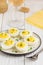 Stuffed eggs, yellow mousse, wine snack, holiday party