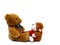 Stuffed monkey animal and stuffed teddy bear facing eachother
