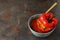 Stuffed pepper in bowl on dark textured background