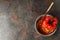 Stuffed pepper in bowl on dark textured background