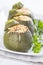 Stuffed round courgettes with grated cheese