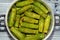 Stuffed squash, courgette, marrow, mahshi, or zucchini filled with white rice, onion, parsley, dill and coriander, selective focus