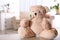 Stuffed teddy bear on table in child hospital