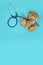 Stuffed teddy bears animal presented as a pediatrician holding a stethoscope with copy space on blue isolated background