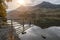 Stuning Autumn Fall landscape image of Lake Buttermere in Lake D