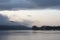 Stuning Autumn Fall sunrise landscape over Coniston Water with mist and wispy clouds