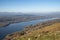 Stuning vibrant Autumn Fall landscape image of view from Gummers How down onto Derwent Wter in Lake District