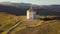 Stunning 4k riseup aerial of countryside church in the valleys of Abruzzo, Italy