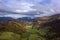 Stunning aerial drone landscape image of glorious vibrant Autumn Fall sun over Thirlmere in Lake District