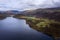 Stunning aerial drone landscape image of glorious vibrant Autumn Fall sun over Thirlmere in Lake District