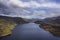 Stunning aerial drone landscape image of glorious vibrant Autumn Fall sun over Thirlmere in Lake District