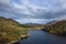 Stunning aerial drone landscape image of glorious vibrant Autumn Fall sun over Thirlmere in Lake District