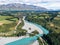 Stunning aerial high angle drone view of Rakaia Gorge Bridge and Rakaia River in inland Canterbury on New Zealand`s South Island.