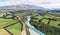 Stunning aerial high angle drone view of Rakaia Gorge Bridge and Rakaia River in inland Canterbury on New Zealand`s South Island.