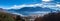 Stunning aerial panorama view of  Locarno cityscape and Lake Maggiore from Madonna del Sasso church, snow covered Swiss Alps