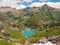 Stunning aerial panorama view of reservoir lake Lago del Zott, Lago di Robiei, Swiss Alps mountains in Canton of Ticino on summer