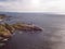 Stunning aerial shot of Ardnamurchan Point, Great Britains most westerly point, with lighthouse and the beautiful white