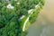 A stunning aerial shot of the still brown waters of the Chattahoochee river surrounded by vast miles of lush green tree