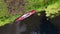 Stunning aerial top view flight drone. Sport paddle boat on natural German River