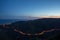 Stunning aerial view of a mountainous highway at evening in Malibu, California